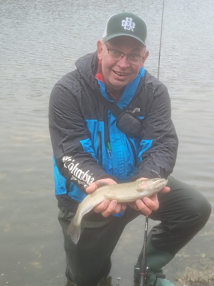 https://www.onthewater.com/wp-content/uploads/2024/01/Neal-Larsson-caught-this-healthy-brown-trout-on-a-classic-bobber-and-worm-rig-on-New-Years-Eve-750x1000.jpg